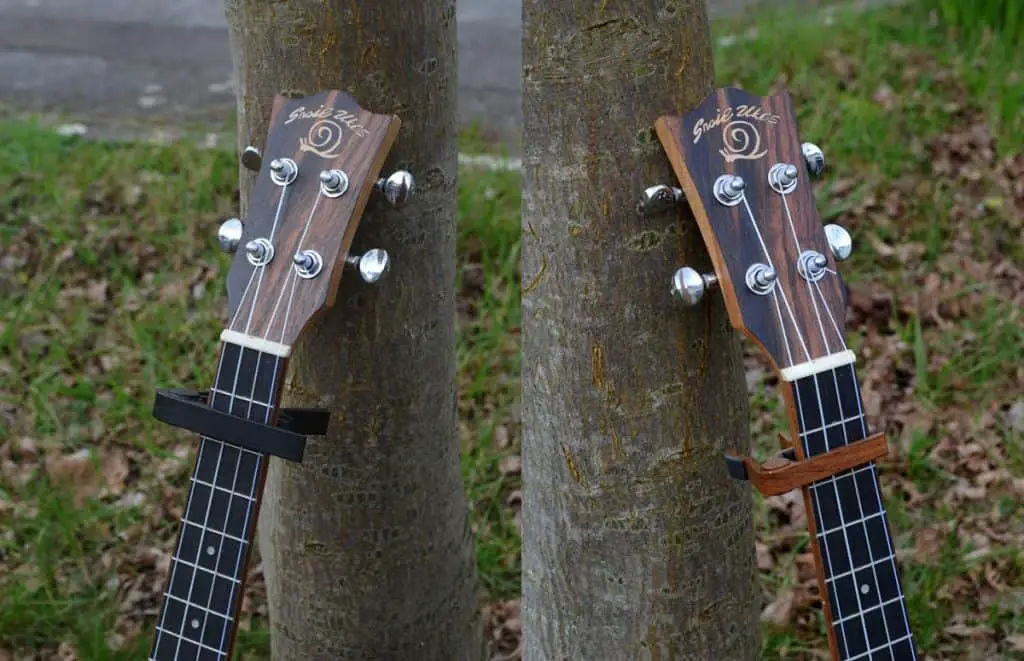 guitar and ukulele capos, side by side