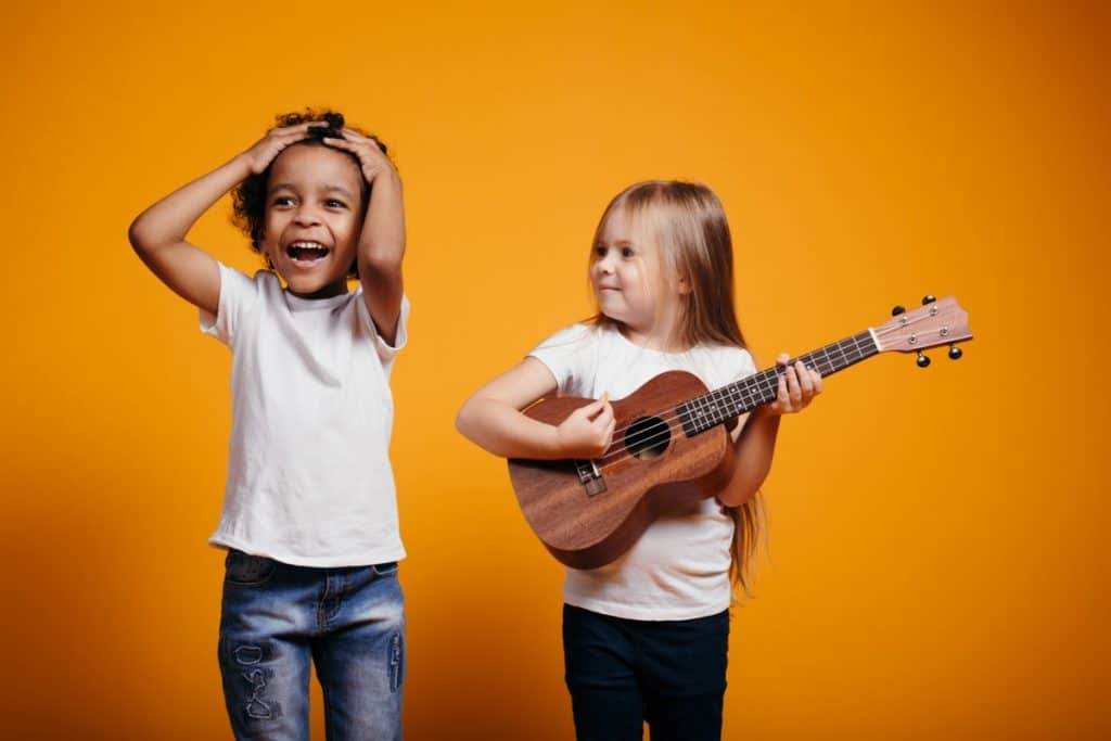 kids playing the ukulele